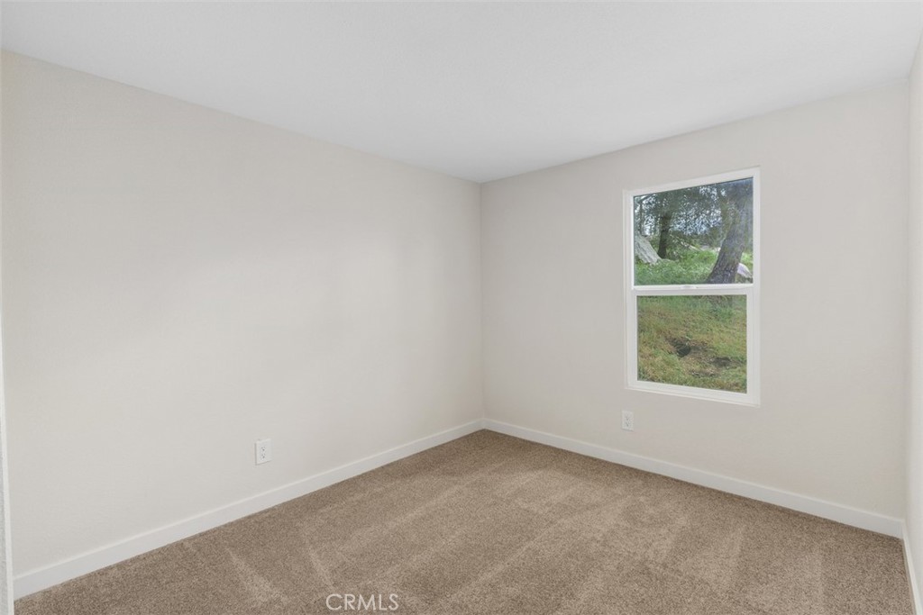 42580 East Benton Road Hemet, CA 92544 - Photo 18 of 31 an empty room with a window