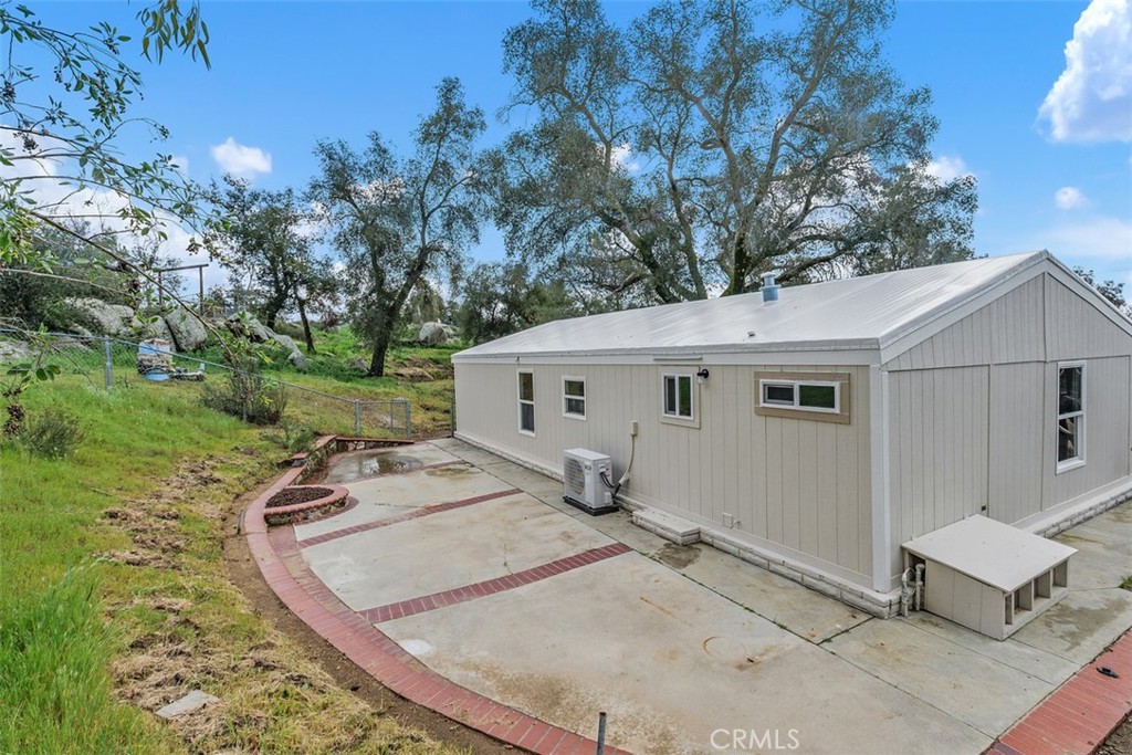 42580 East Benton Road Hemet, CA 92544 - Photo 26 of 31 a view of a house with a backyard