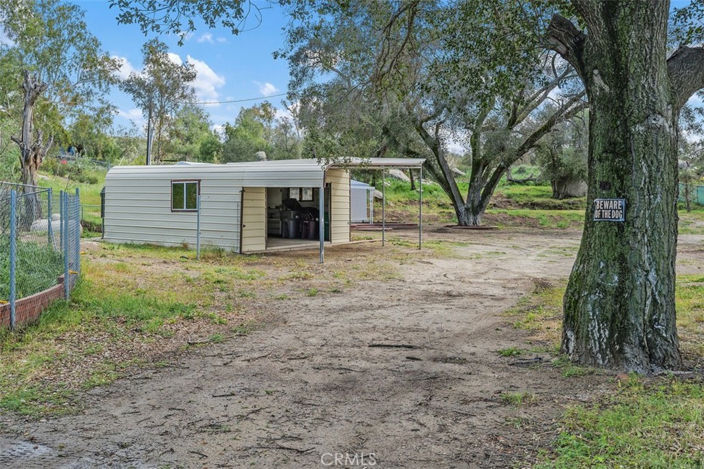 42580 East Benton Road Hemet, CA 92544 - Photo 29 of 31 a view of a house with a tree and a tree