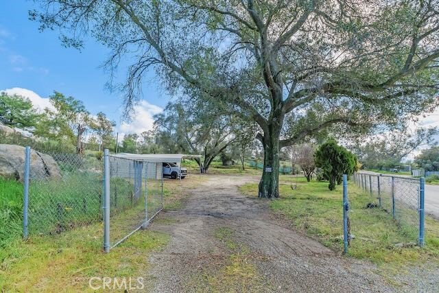 42580 East Benton Road Hemet, CA 92544 - Photo 31 of 31 a view of a backyard with trees