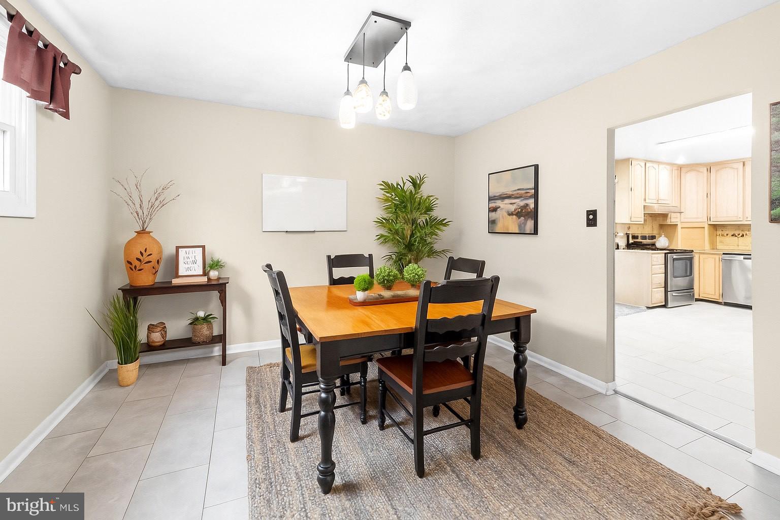 25 Clemson Road Cherry Hill, NJ 08034 - Photo 15 of 34 a view of a dining room with furniture and wooden floor