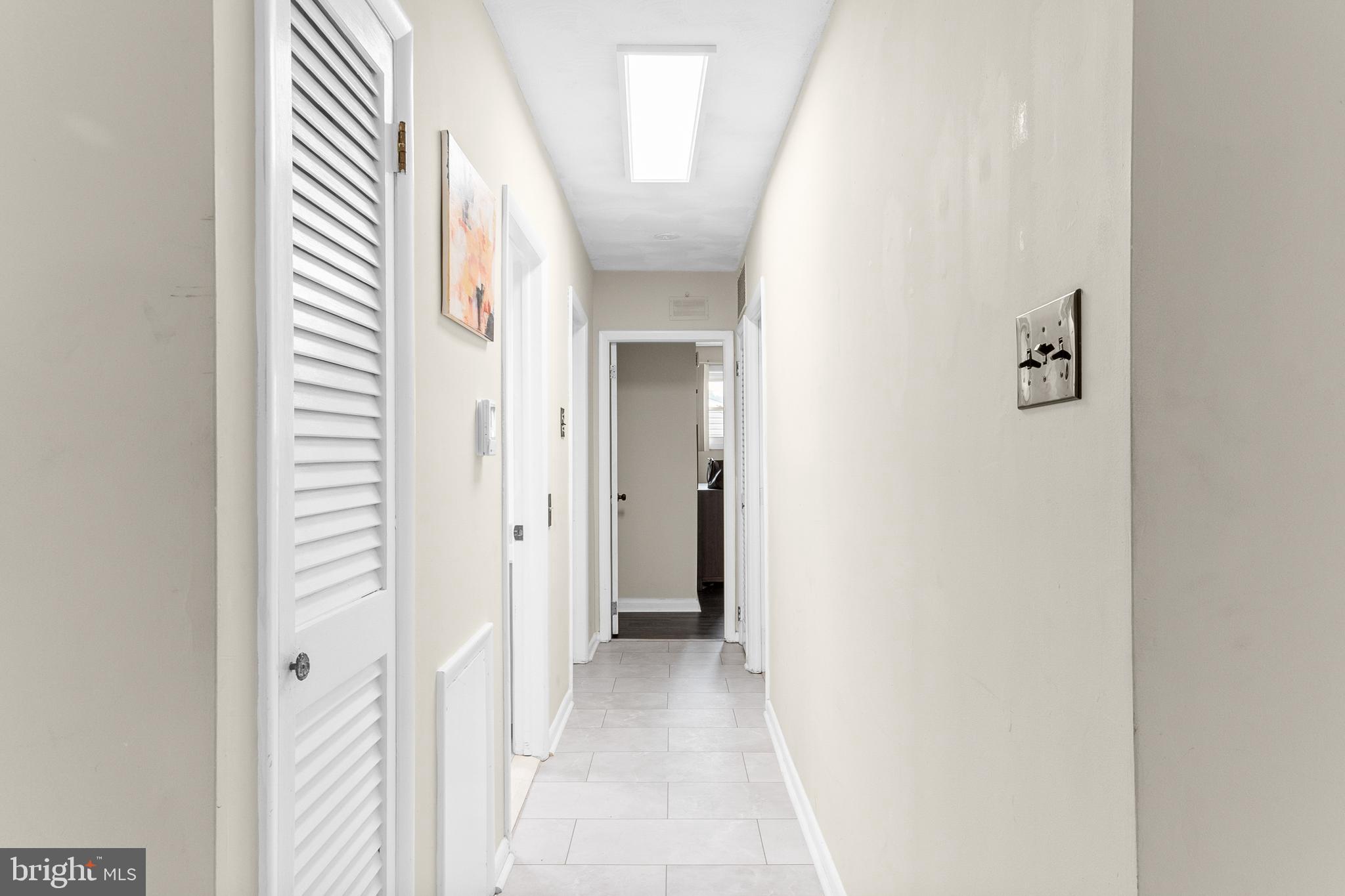25 Clemson Road Cherry Hill, NJ 08034 - Photo 17 of 34 a view of a hallway with a white walls