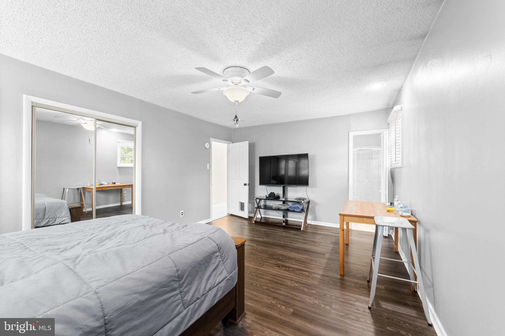 25 Clemson Road Cherry Hill, NJ 08034 - Photo 27 of 34 a bedroom with a bed and a flat screen tv