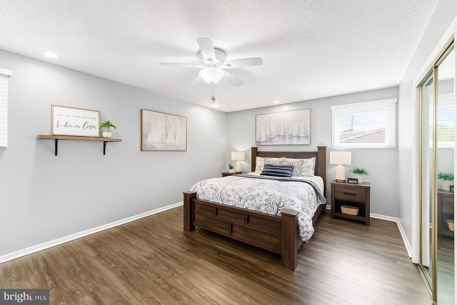 25 Clemson Road Cherry Hill, NJ 08034 - Photo 29 of 34 a bedroom with a bed and wooden floor