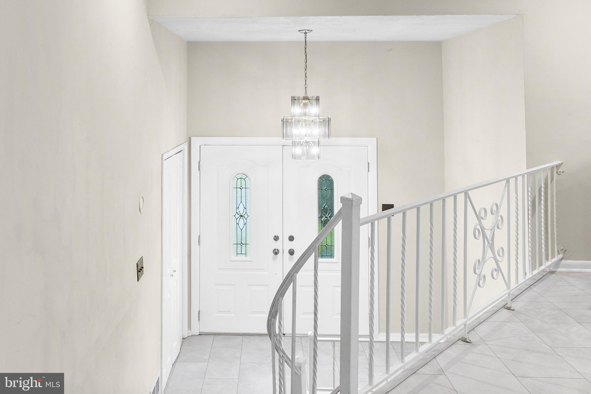 25 Clemson Road Cherry Hill, NJ 08034 - Photo 5 of 34 a view of a hallway with windows