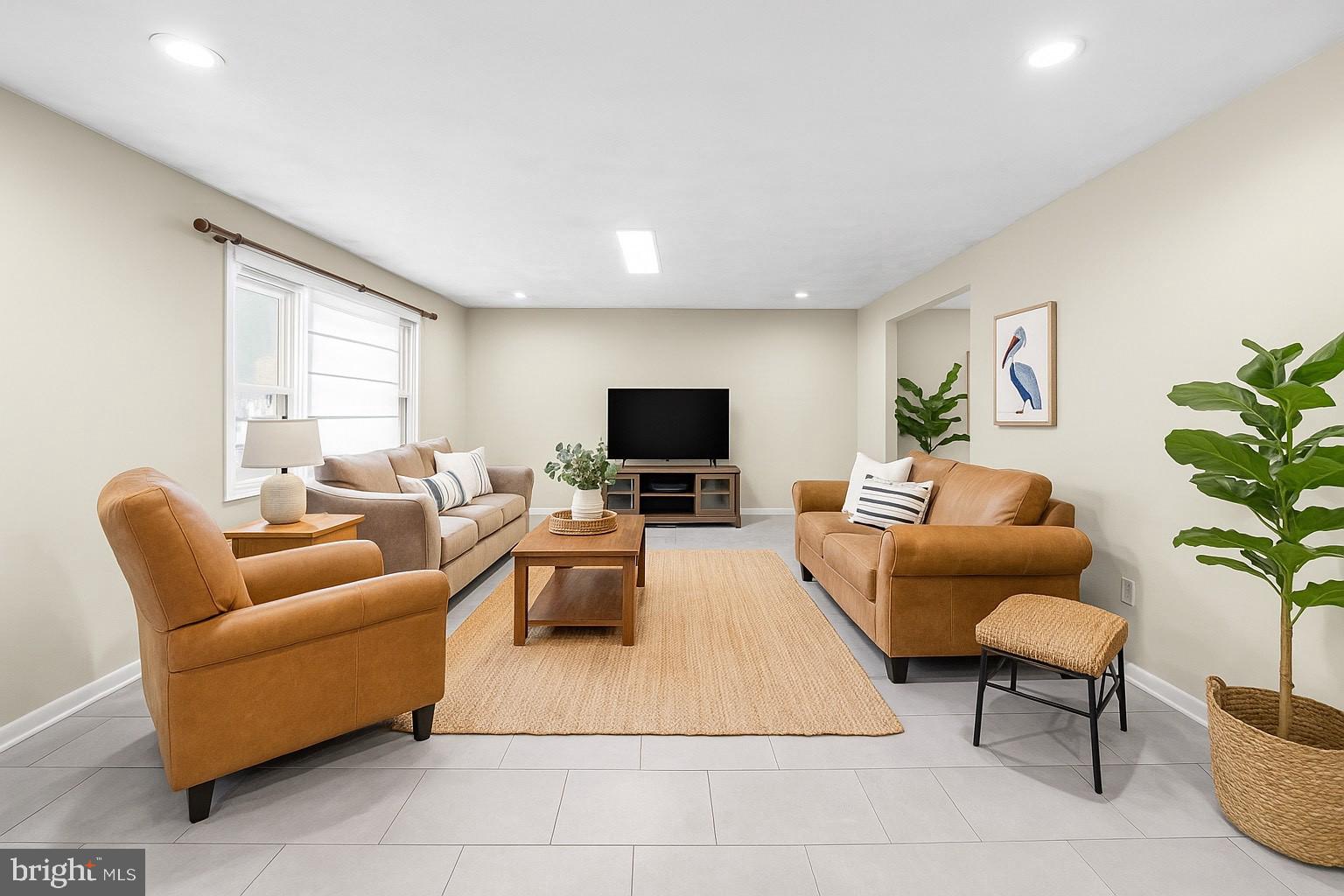 25 Clemson Road Cherry Hill, NJ 08034 - Photo 8 of 34 a living room with furniture and a flat screen tv