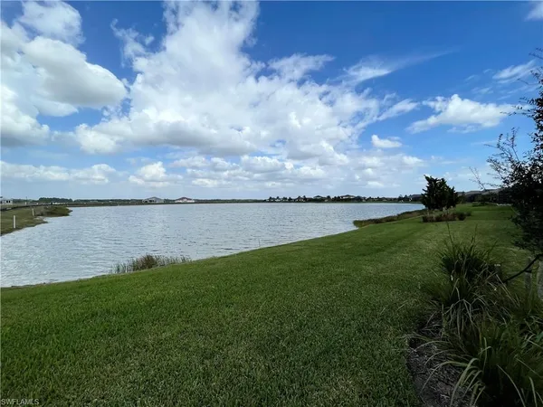 a view of a lake from a yard