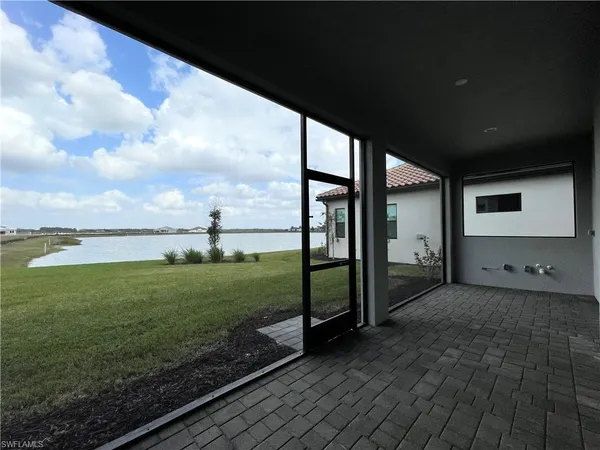 a view of a porch with a big yard