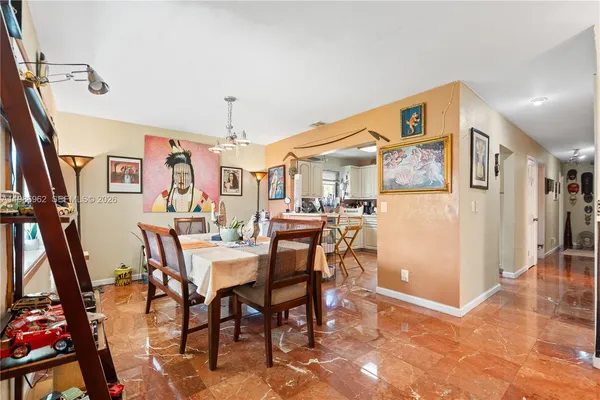 a view of a dining room with furniture