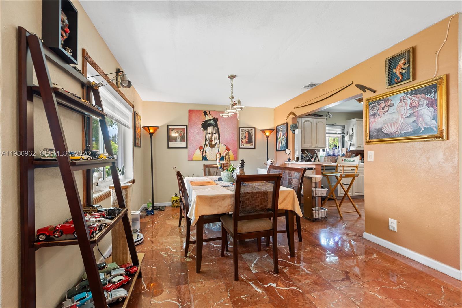 720 Northwest 4th Street Hallandale Beach, FL 33009 - Photo 12 of 27 a view of a dining room with furniture