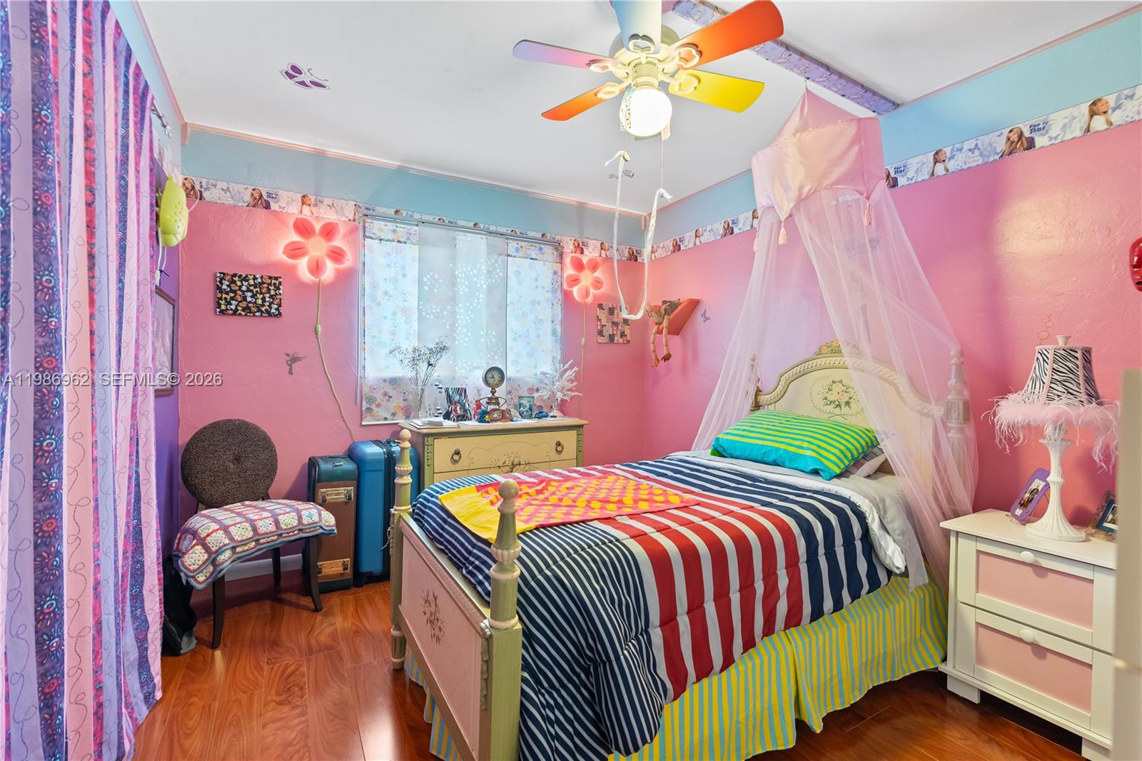 720 Northwest 4th Street Hallandale Beach, FL 33009 - Photo 24 of 27 a bedroom with a bed and a couch