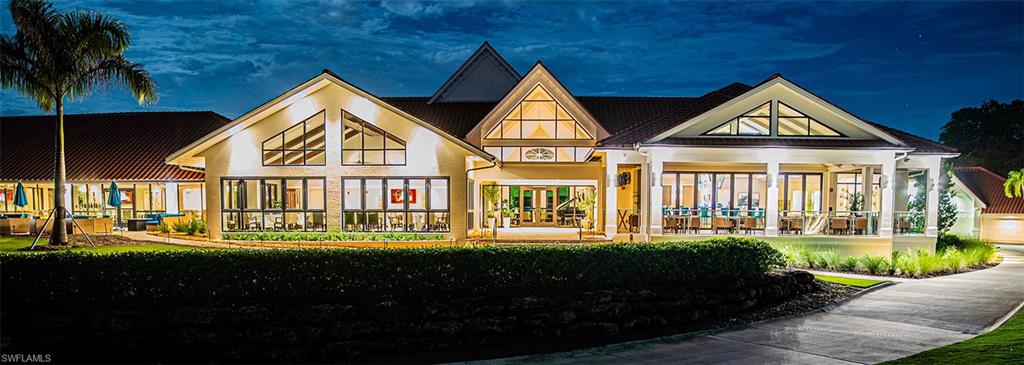 421 Countryside Drive Naples, FL 34104 - Photo 44 of 44 View of Club at twilight