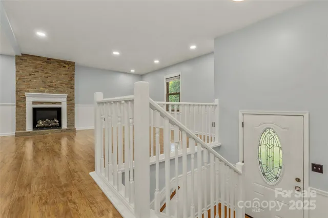 a view of entryway with wooden floor