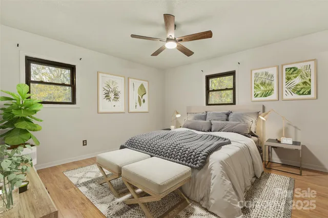 a bed room with bed and a window