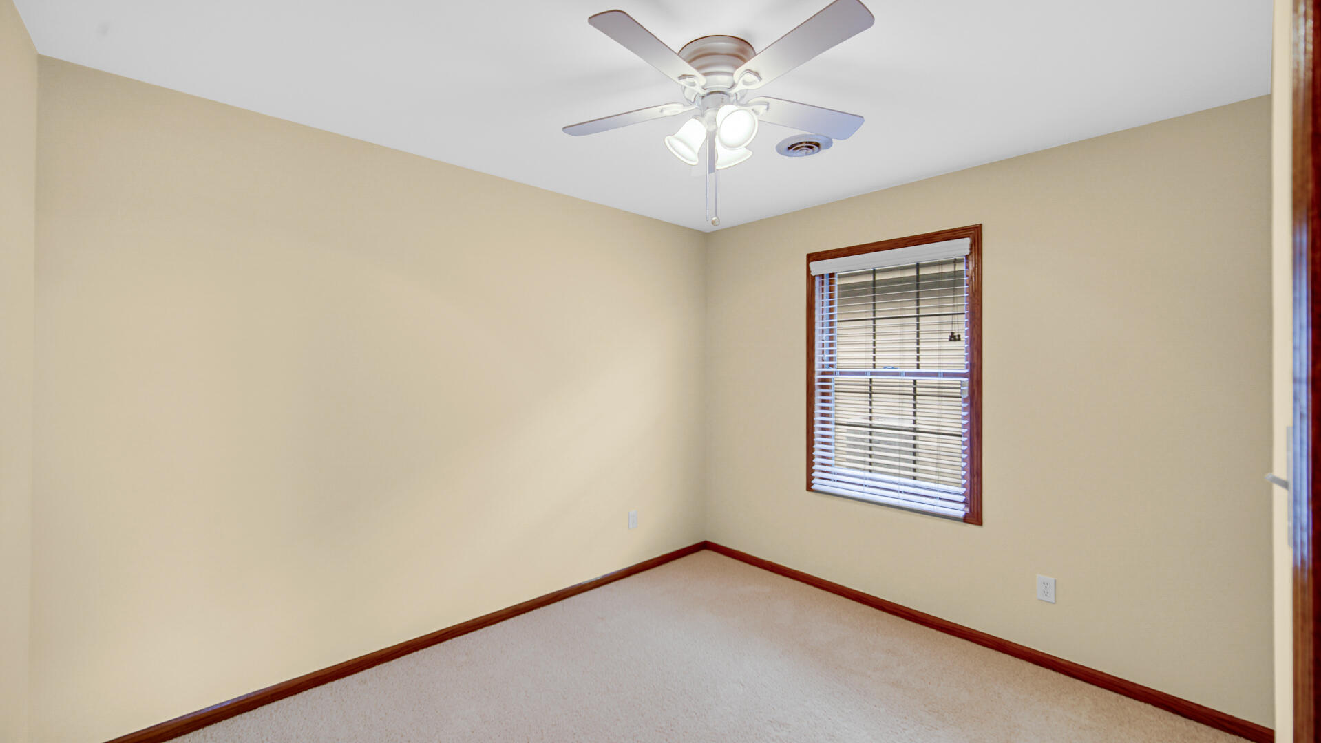 2635 43rd Street Highland, IN 46322 - Photo 19 of 24 an empty room with windows and fan
