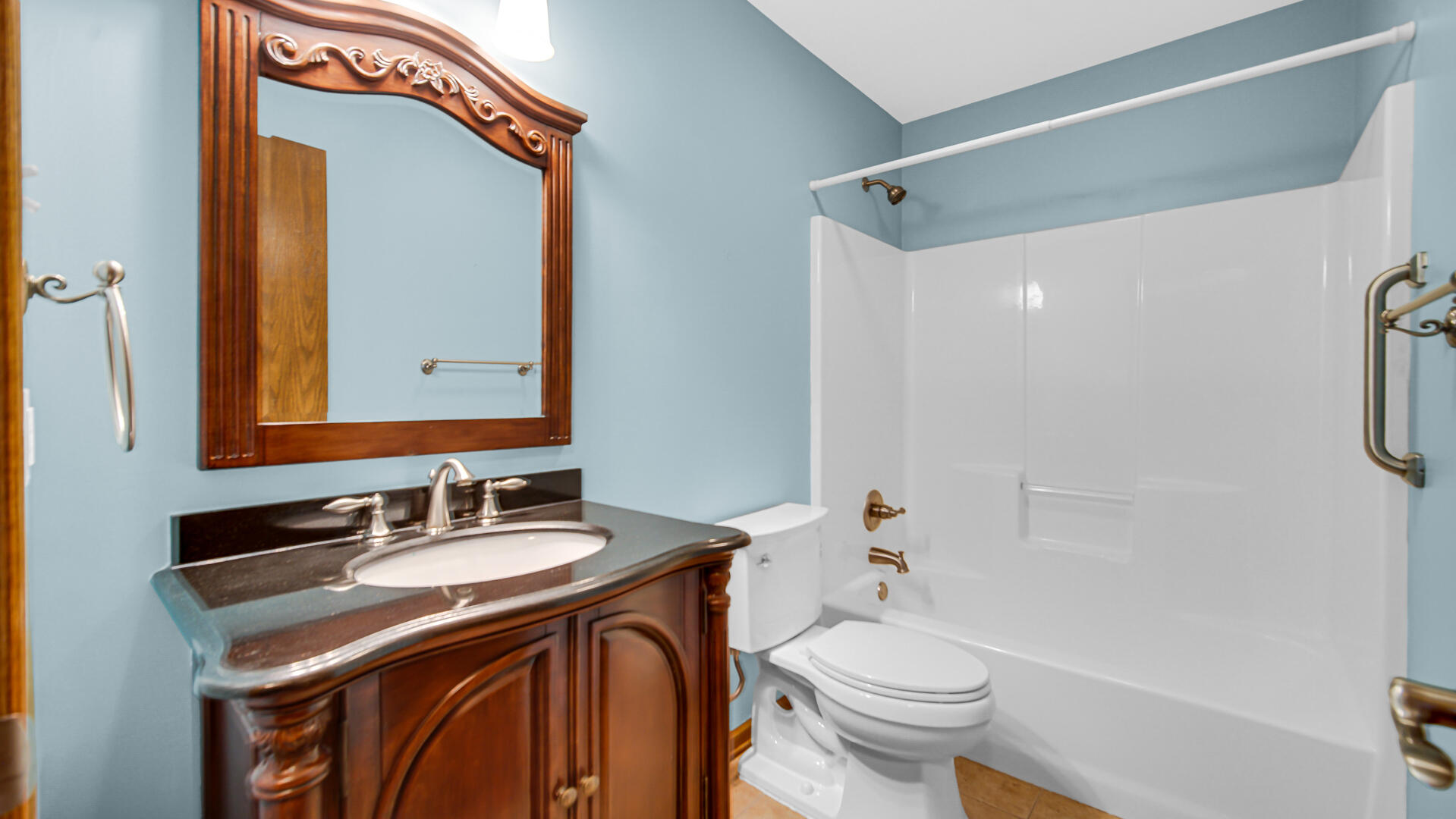 2635 43rd Street Highland, IN 46322 - Photo 20 of 24 a bathroom with a sink a toilet and shower