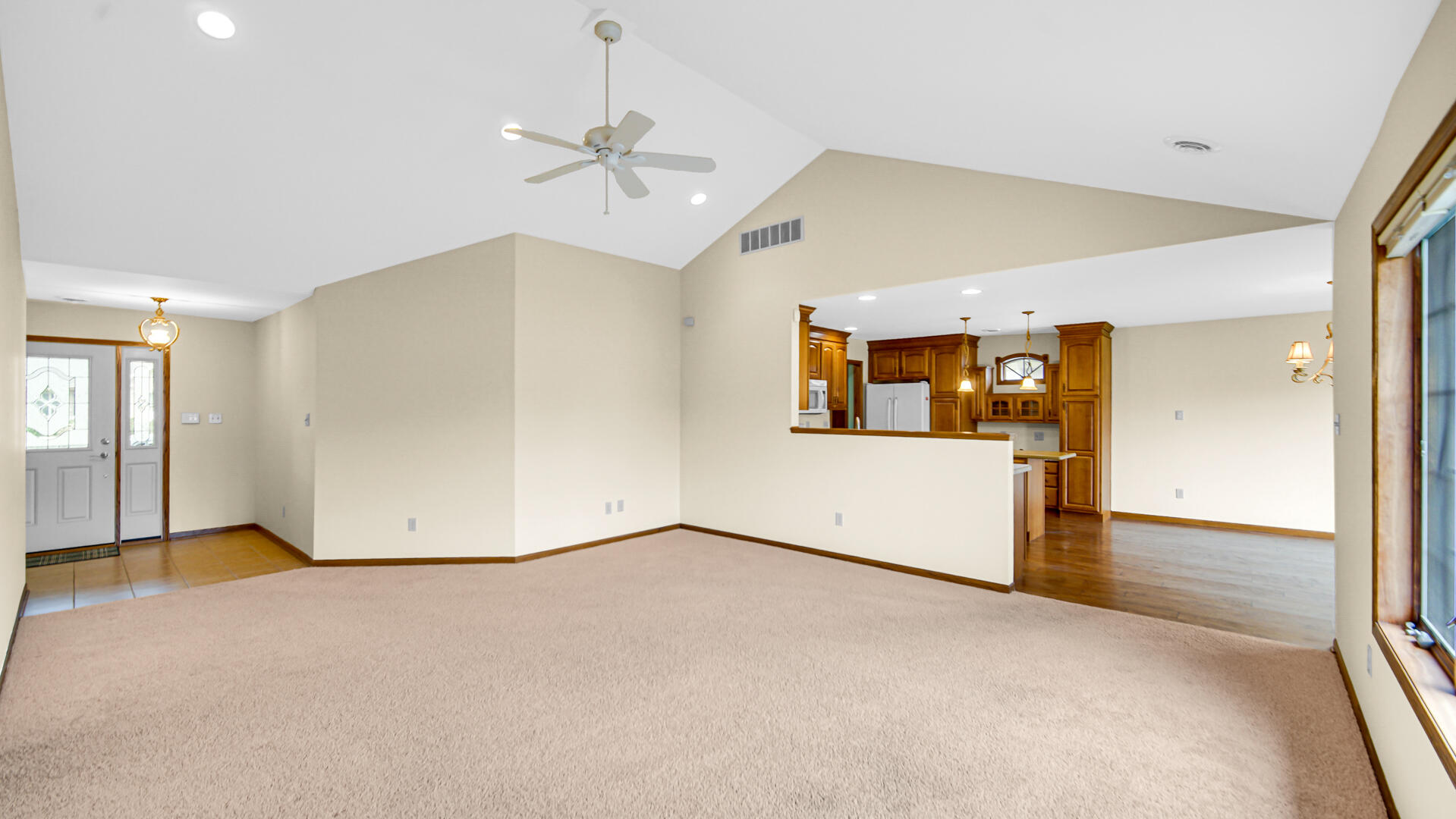 2635 43rd Street Highland, IN 46322 - Photo 2 of 24 an empty room with a empty space and ceiling fan