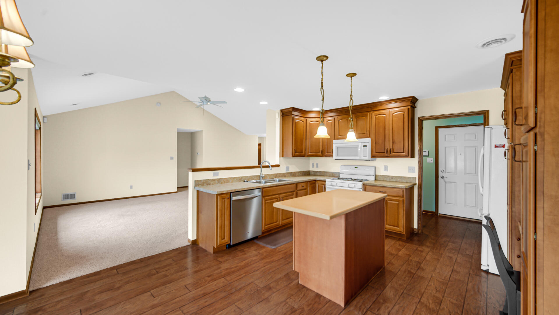 2635 43rd Street Highland, IN 46322 - Photo 5 of 24 a kitchen with granite countertop a sink a counter top space and stainless steel appliances