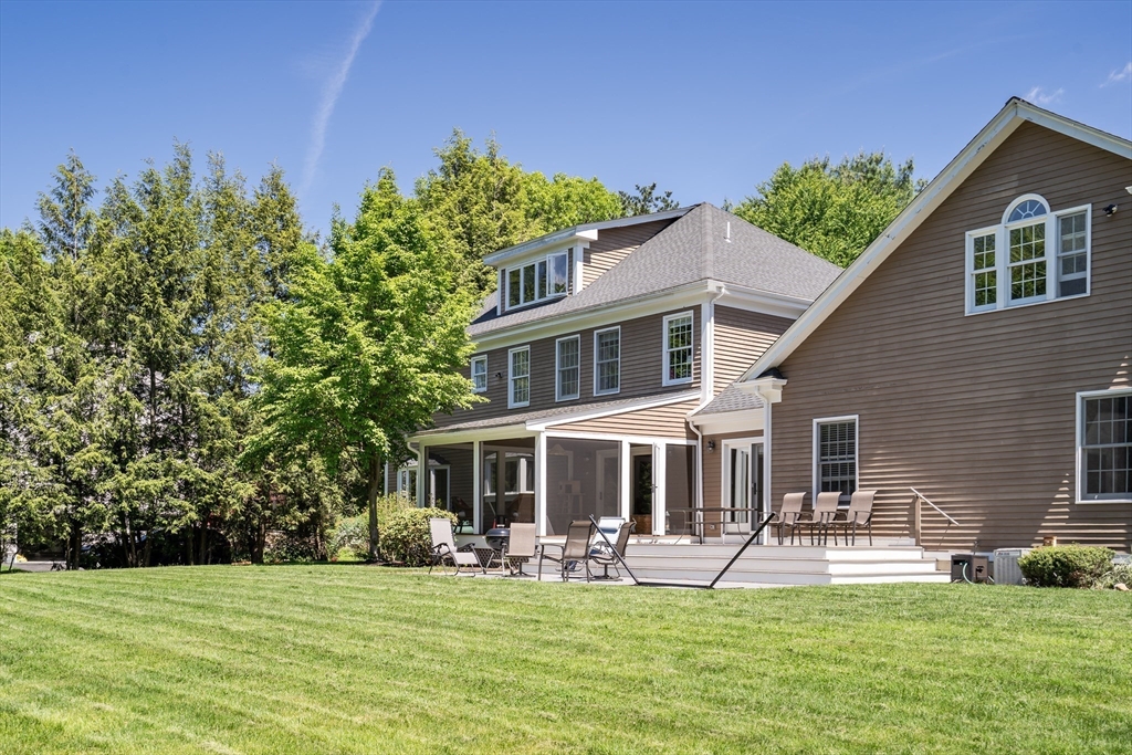 34 Solomon Pierce Road Lexington, MA 02420 - Photo 36 of 42 a view of a house with a yard porch and sitting area