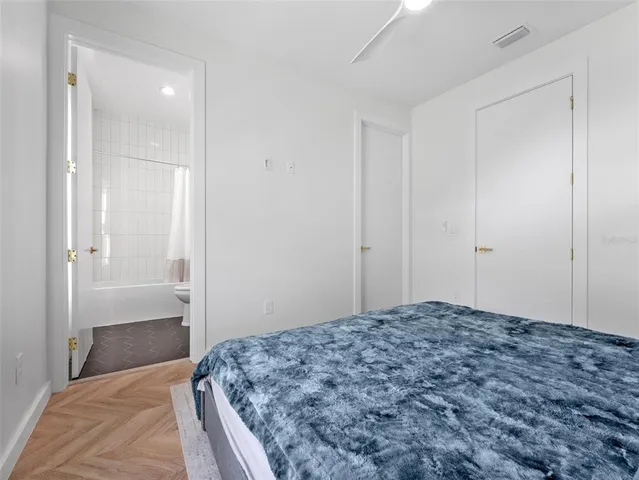 a bathroom with a toilet and a bathtub