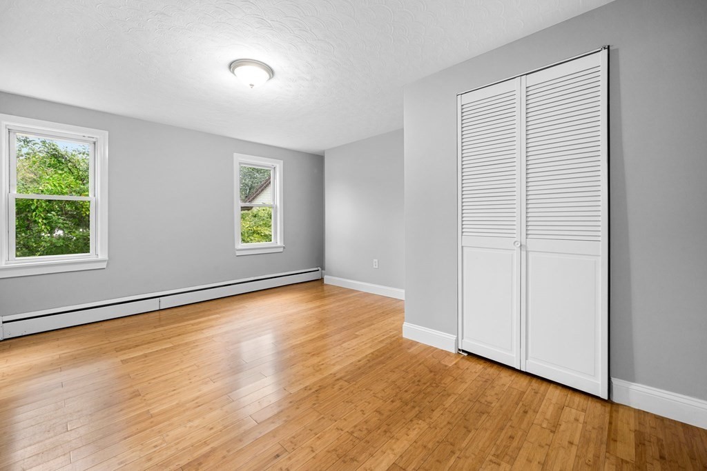 19 Forest Drive Auburn, MA 01501 - Photo 12 of 31 an empty room with windows