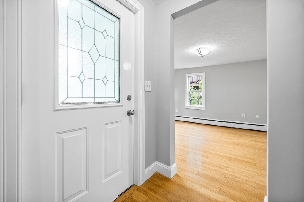 19 Forest Drive Auburn, MA 01501 - Photo 15 of 31 an empty room with a window