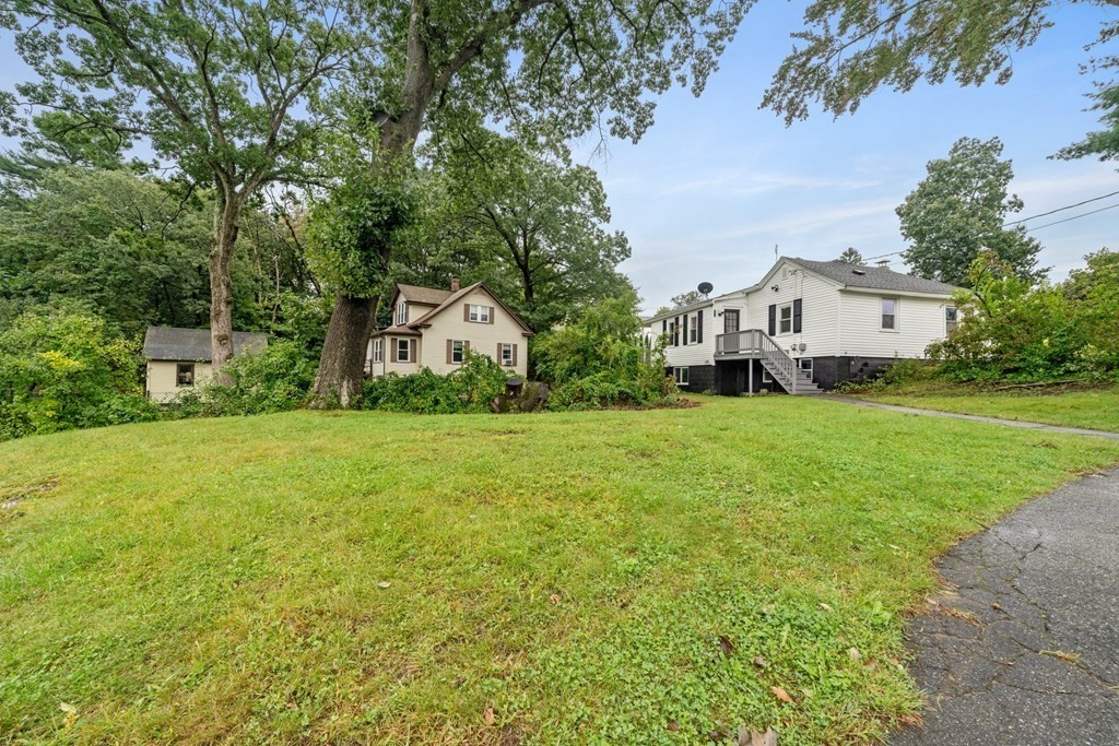 19 Forest Drive Auburn, MA 01501 - Photo 28 of 31 a view of a house with a yard
