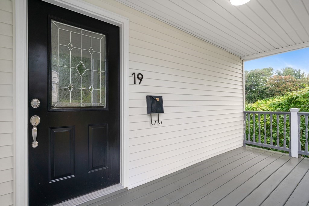 19 Forest Drive Auburn, MA 01501 - Photo 5 of 31 a view of a house with wooden floor and a window