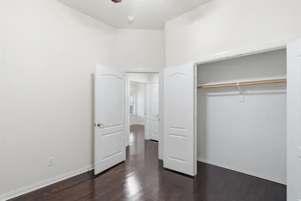 a view of a porch with furniture and garden