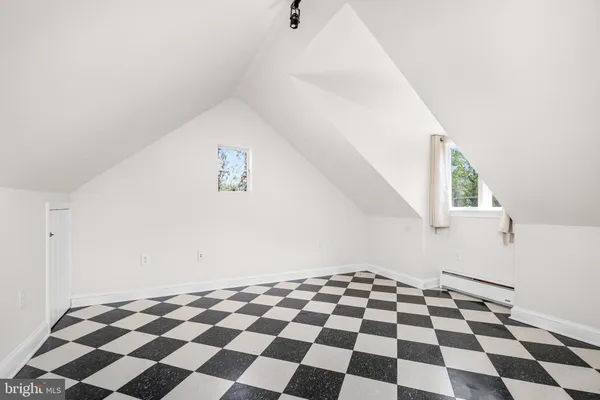 a view of a black and white checkered floor