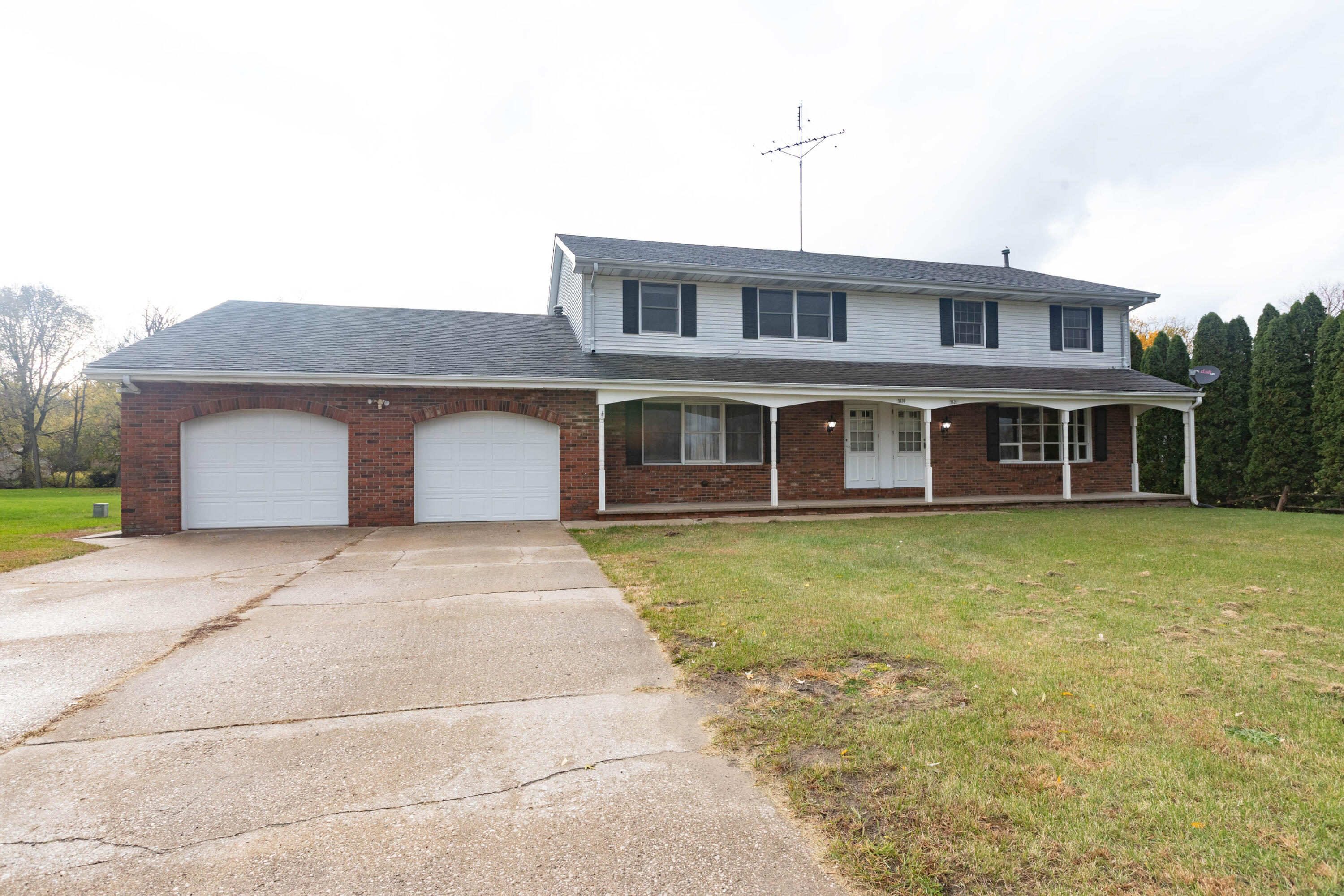 5630 Tilly Road St. Joseph, MI 49085 - Photo 1 of 16 01_Frontyard_1