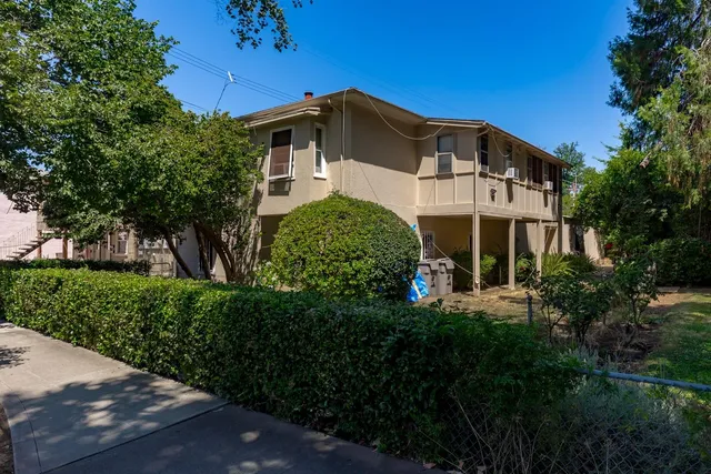 a room with a sink and a washer dryer