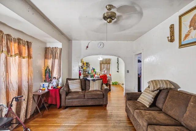 a dining room with furniture and window