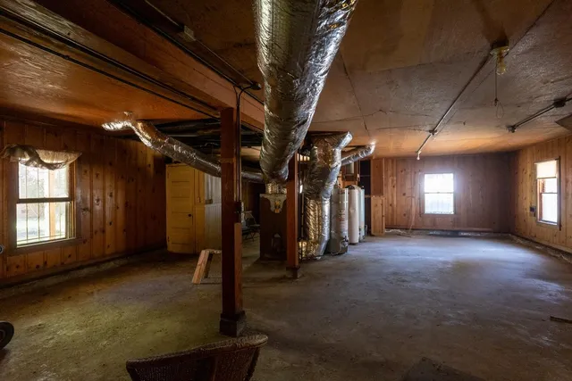 a white refrigerator freezer and a stove sitting inside of a kitchen