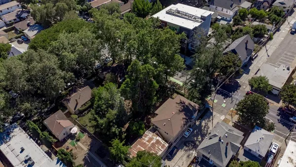 a car parked in front of a house