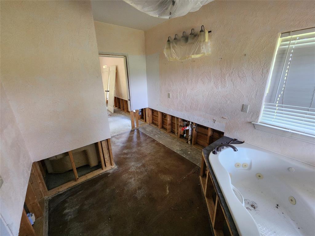 17555 County Road 330 Terrell, TX 75161 - Photo 17 of 32 a view of a bathroom with sink and mirror