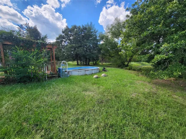 a view of outdoor space and yard