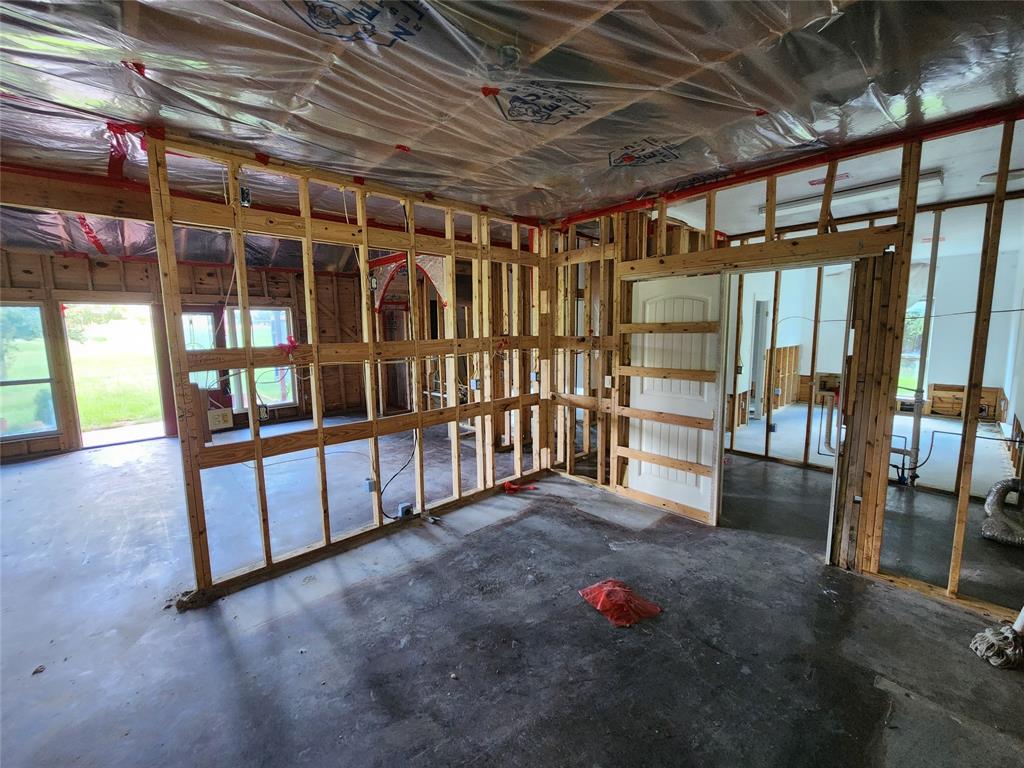 17555 County Road 330 Terrell, TX 75161 - Photo 10 of 32 a view of an empty room with wooden floor