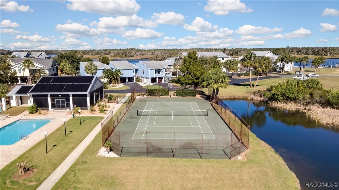 2855 North Rivers Edge Boulevard, Unit 213 Crystal River, FL 34429 - Photo 41 of 62 a view of a swimming pool with an ocean view
