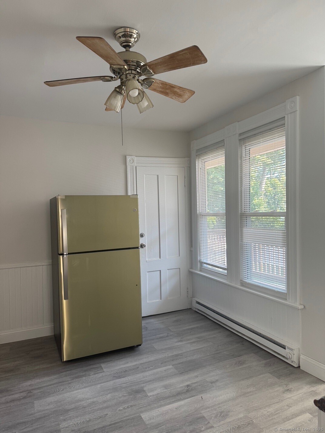 39 Maple Street New Haven, CT 06511 - Photo 3 of 10 a view of an empty room with a window