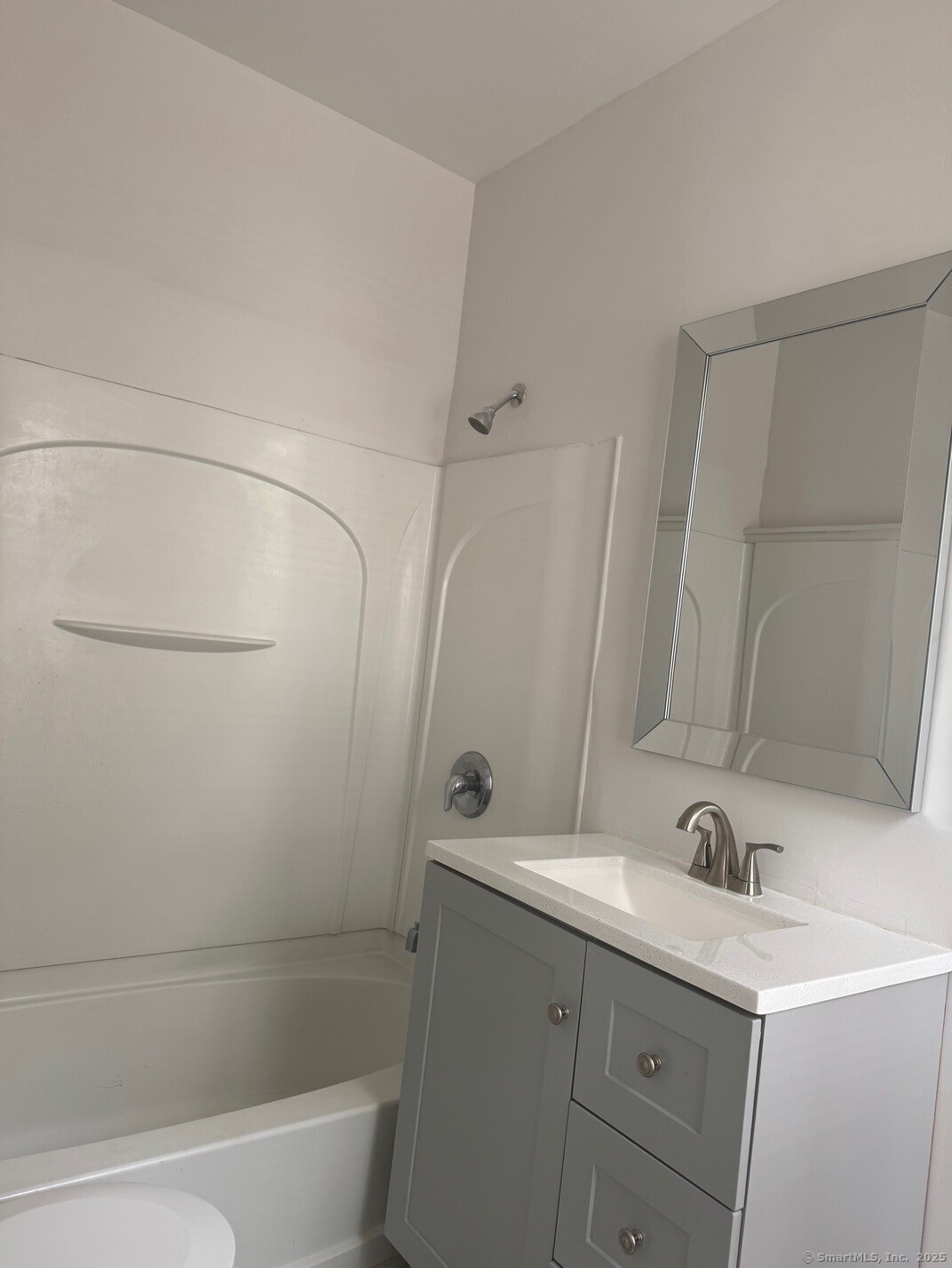 39 Maple Street New Haven, CT 06511 - Photo 8 of 10 a bathroom with a bathtub shower sink vanity and toilet