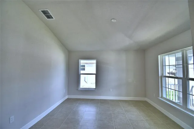 a kitchen with kitchen island a counter top space a sink and appliances
