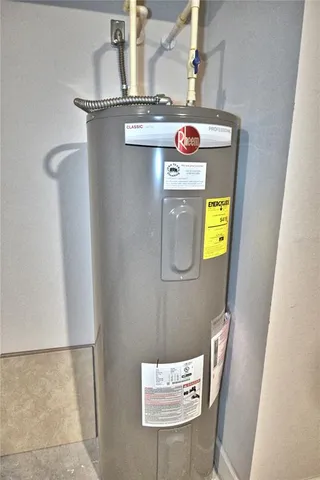 a view of a room with window and chandelier