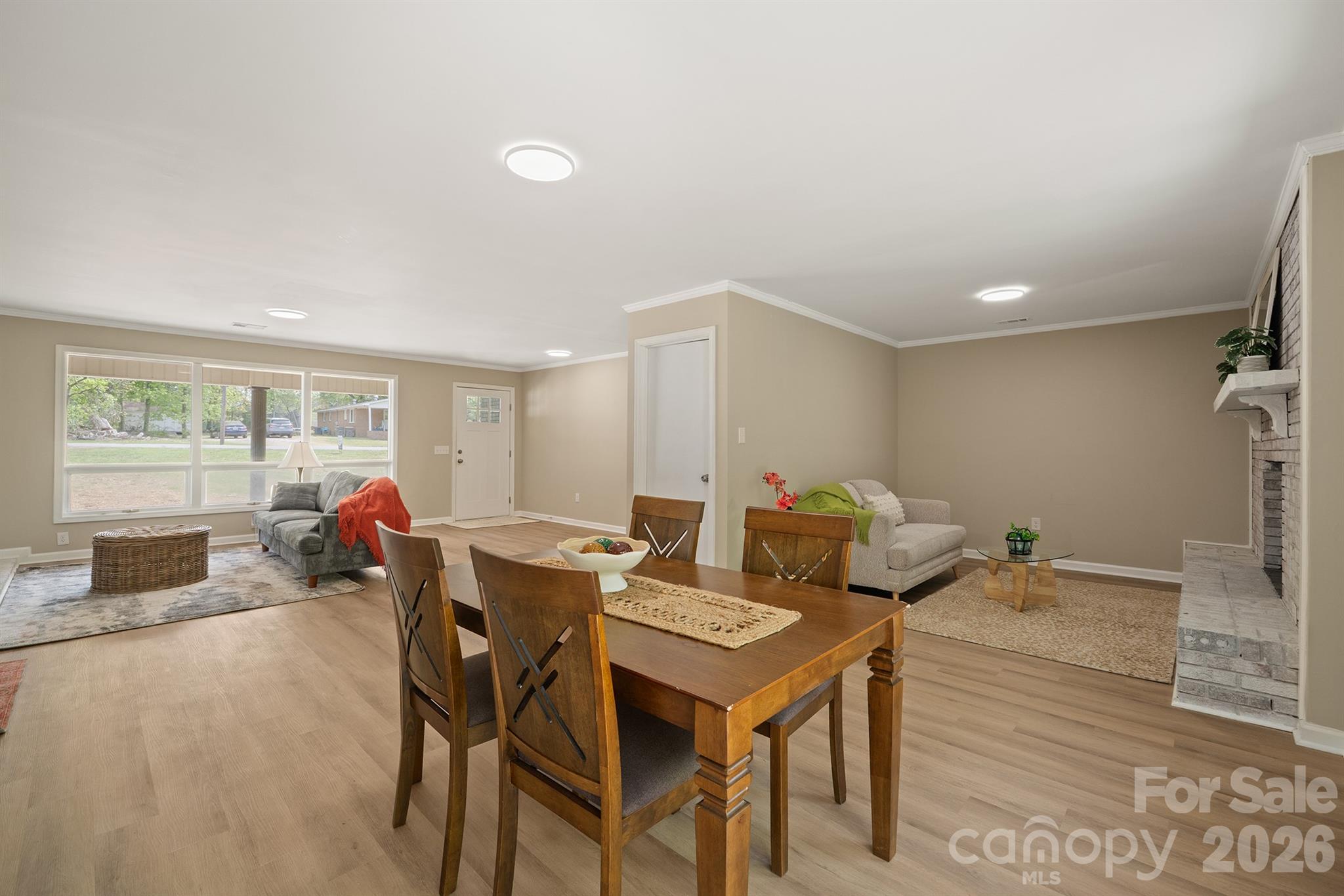 624 Flicker Street Concord, NC 28027 - Photo 11 of 47 a living room with furniture a window and a table