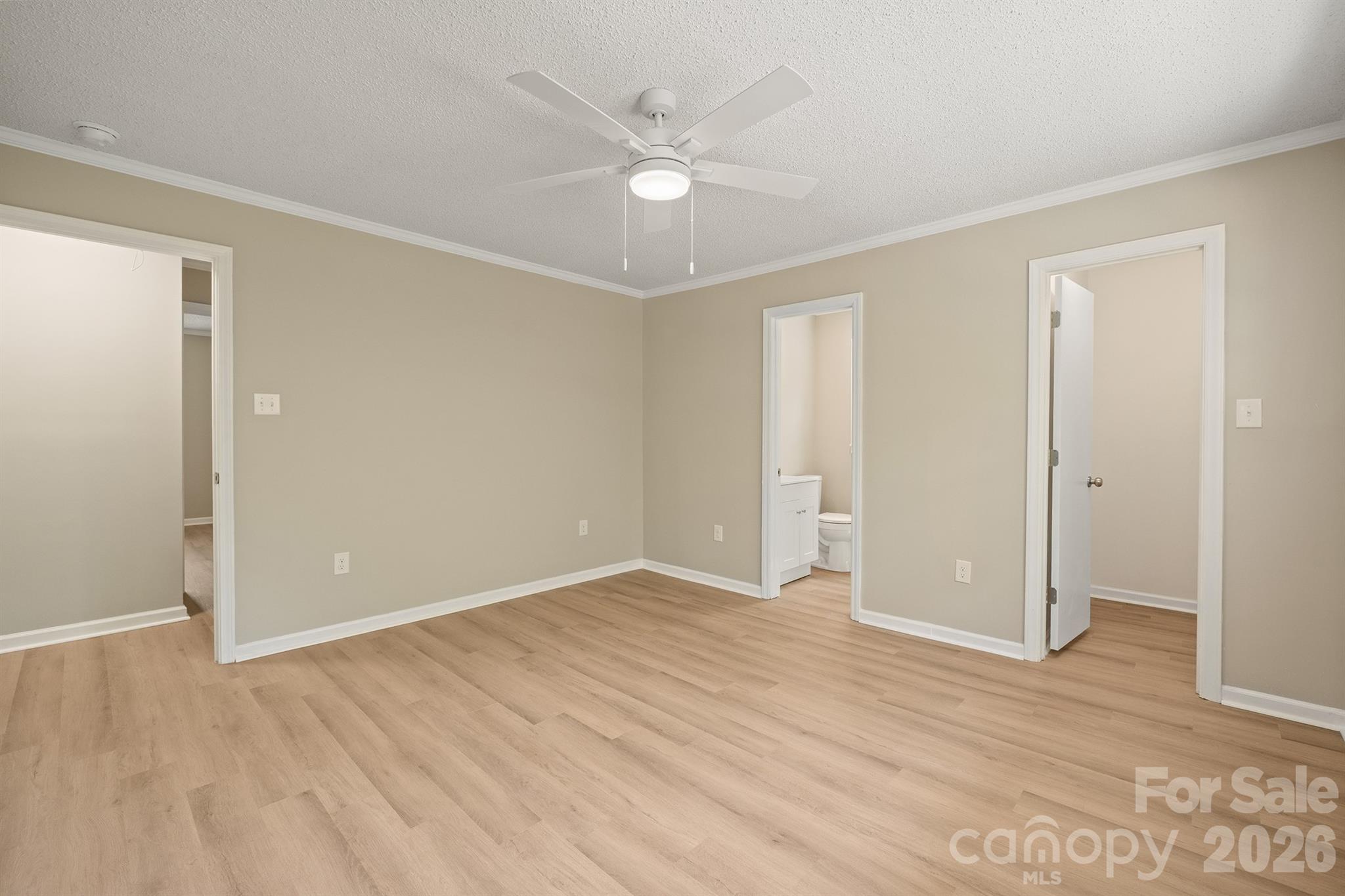 624 Flicker Street Concord, NC 28027 - Photo 27 of 47 a view of an empty room with wooden floor