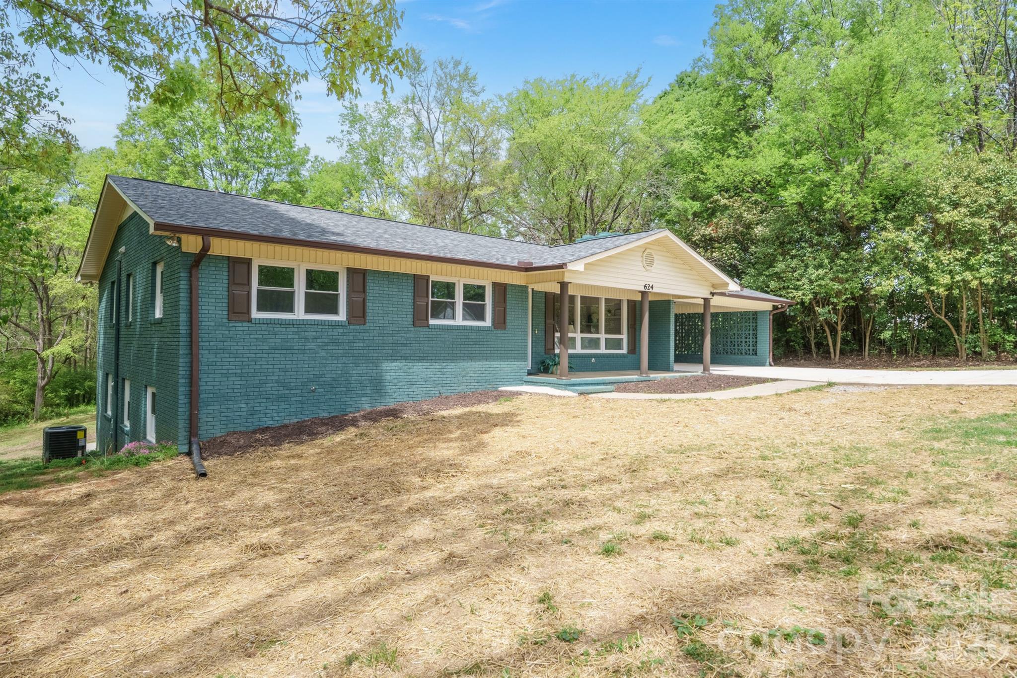 624 Flicker Street Concord, NC 28027 - Photo 3 of 47 a front view of a house with yard and green space