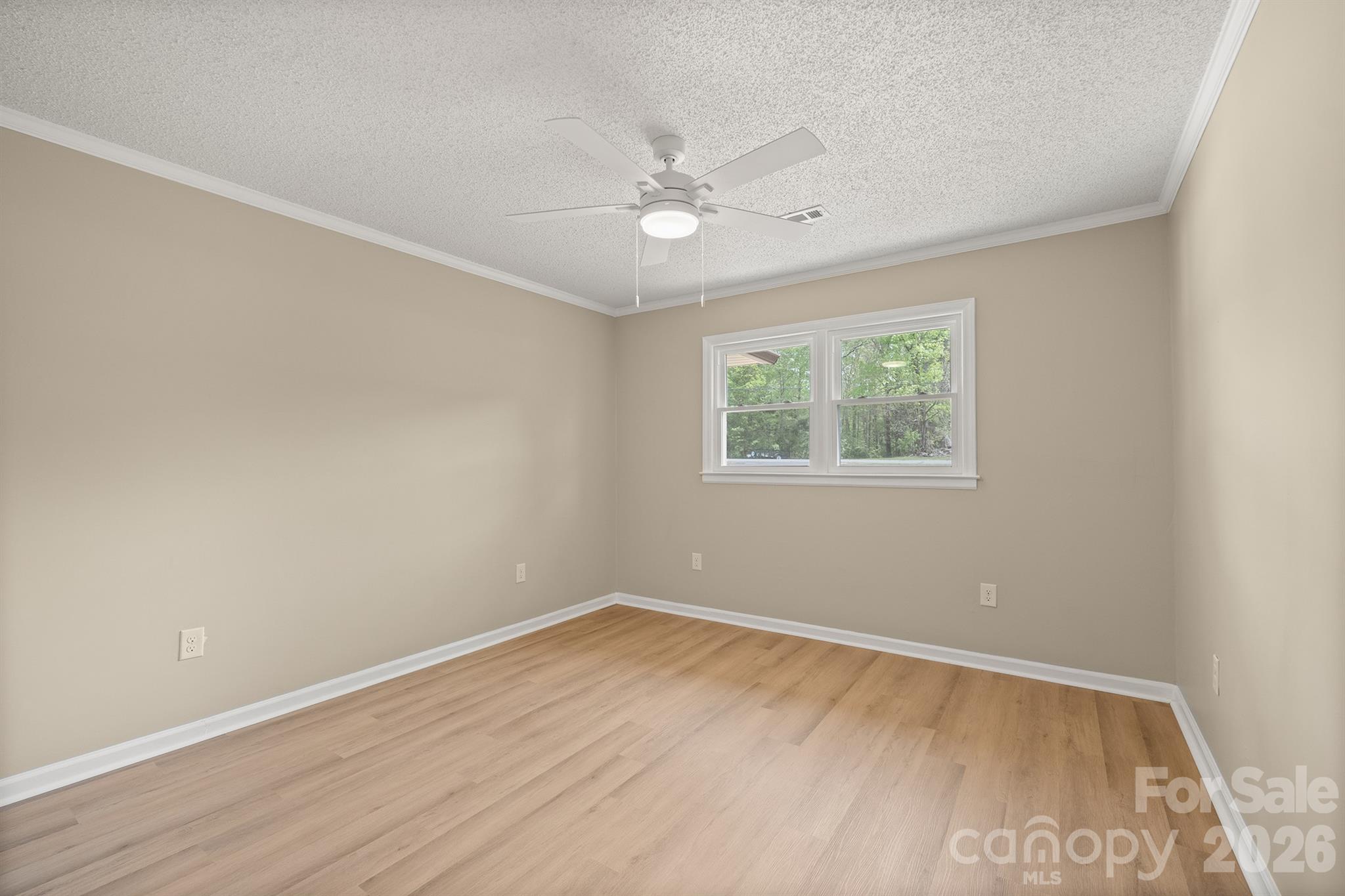 624 Flicker Street Concord, NC 28027 - Photo 33 of 47 a view of a room with wooden floor and window