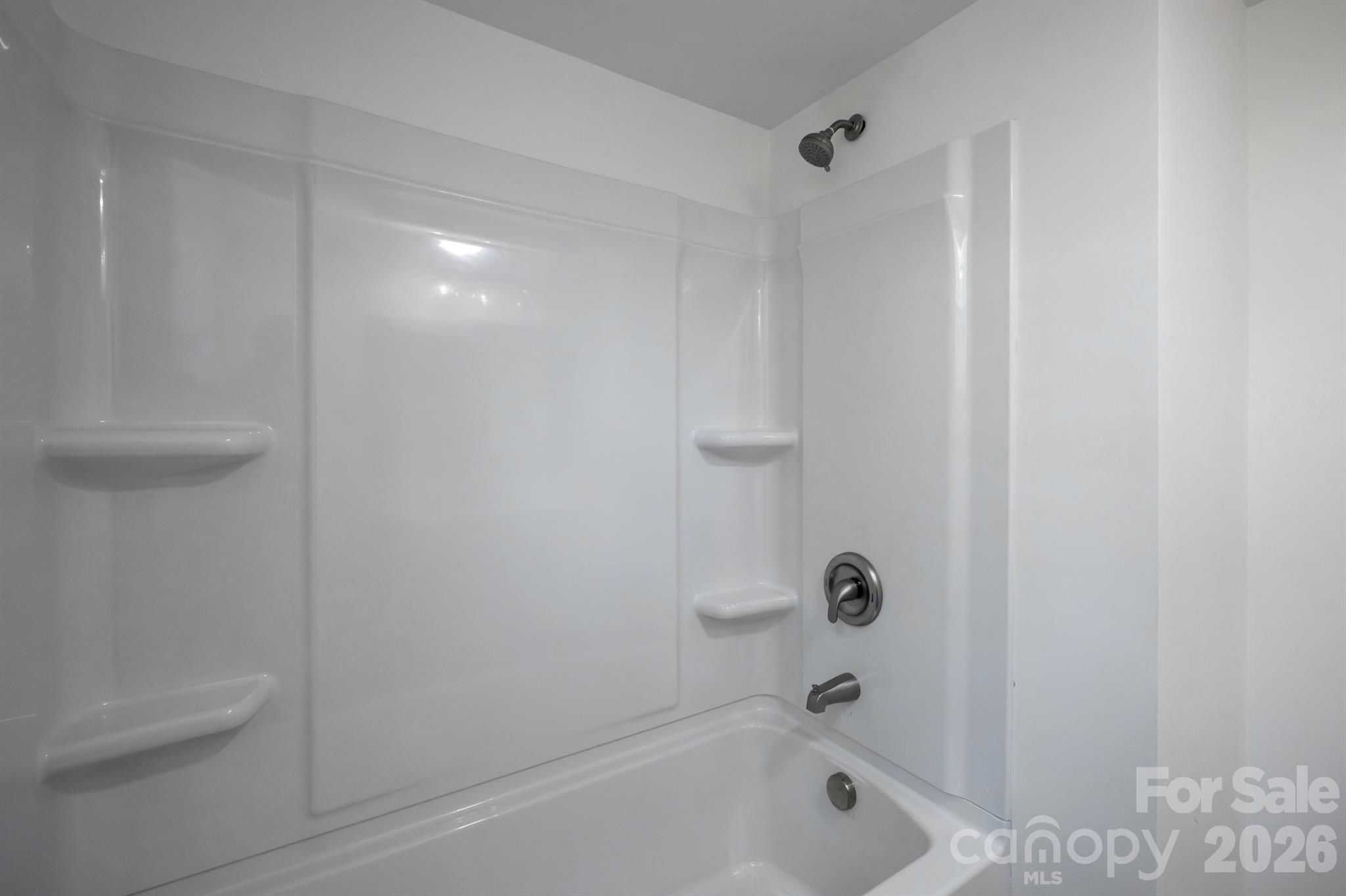 624 Flicker Street Concord, NC 28027 - Photo 39 of 47 a bathroom with a bathtub