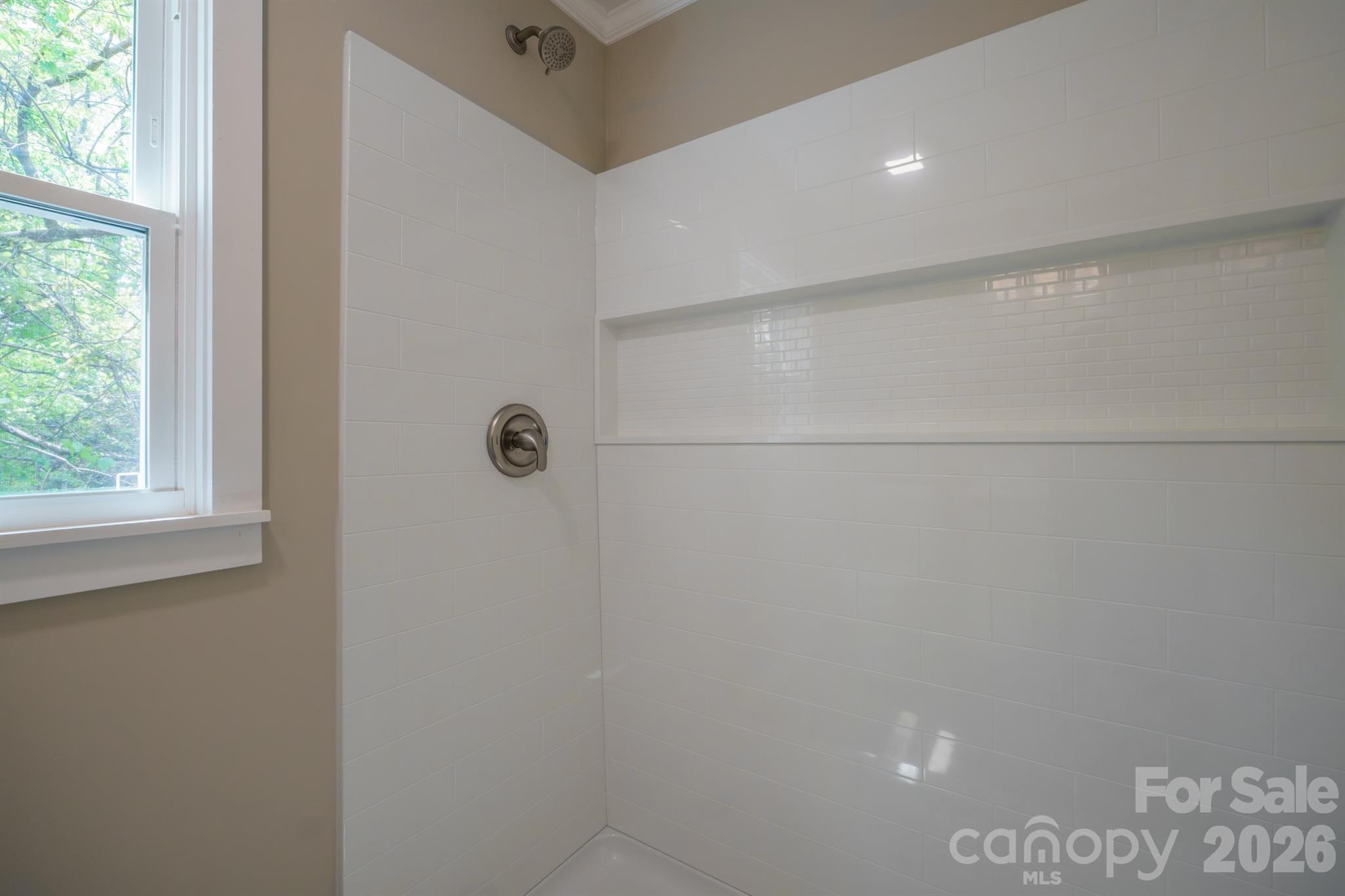 624 Flicker Street Concord, NC 28027 - Photo 40 of 47 a bathroom with a shower