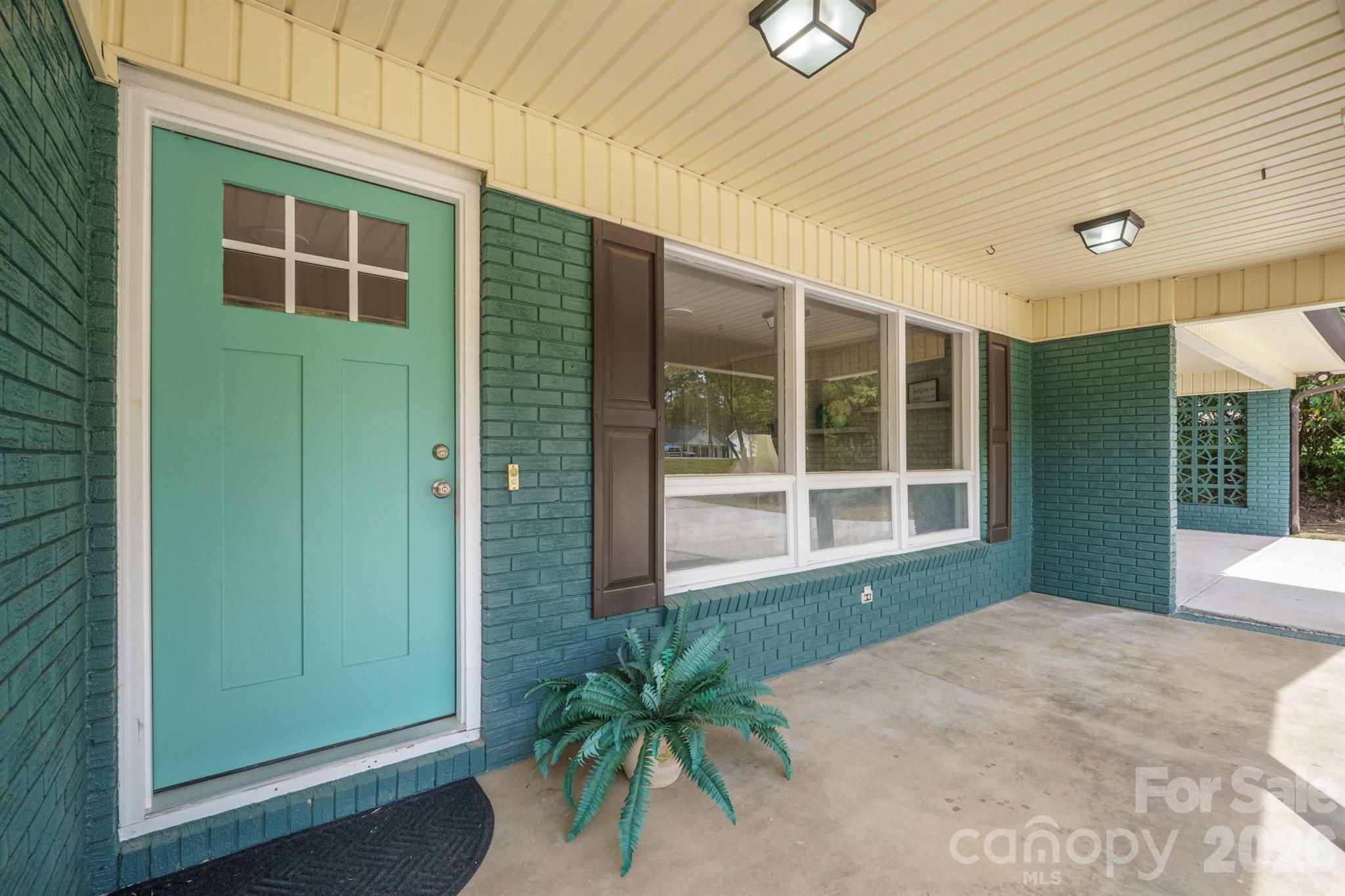 624 Flicker Street Concord, NC 28027 - Photo 4 of 47 a front view of a house with a yard